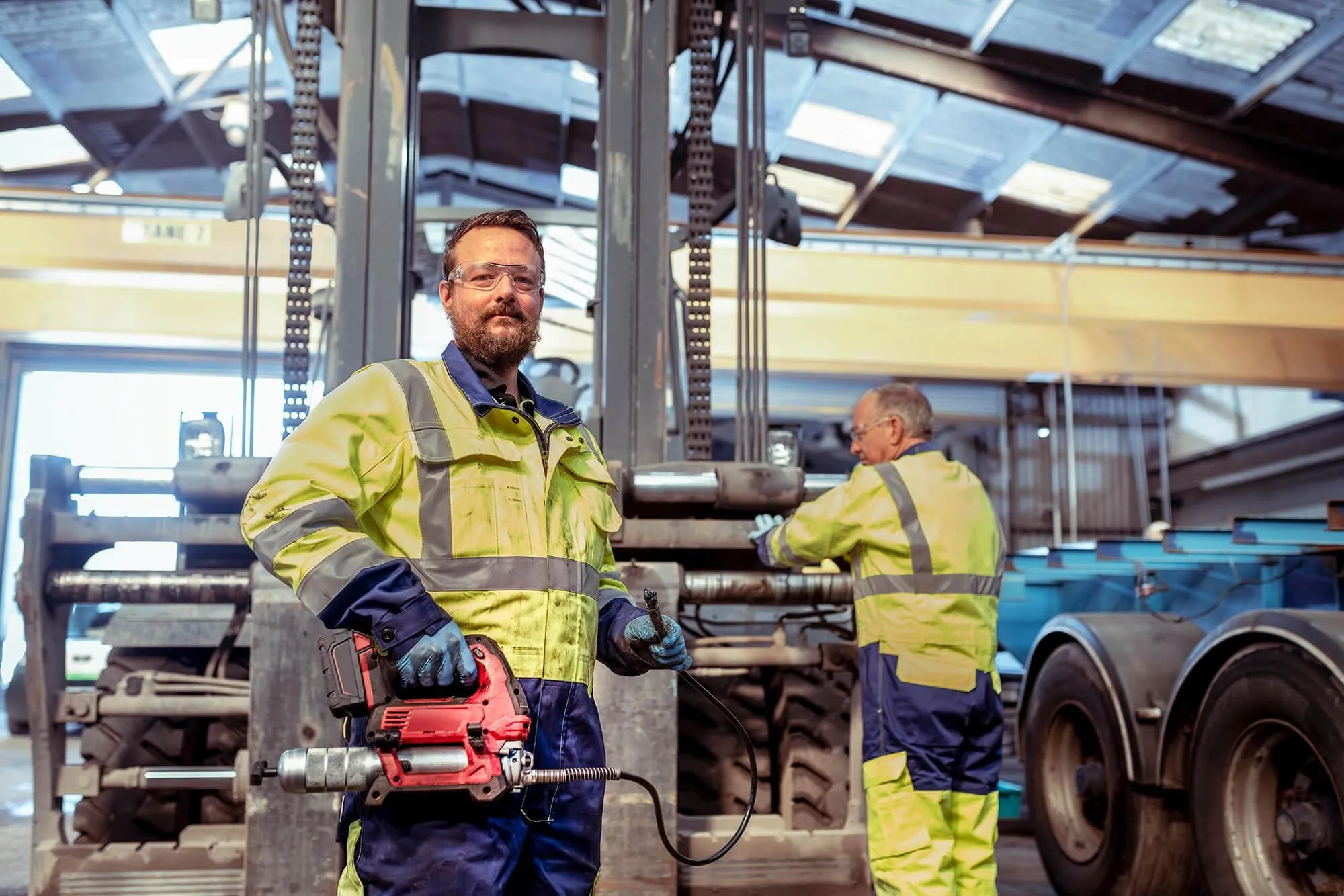 Hickman Engineering team working on a forklift