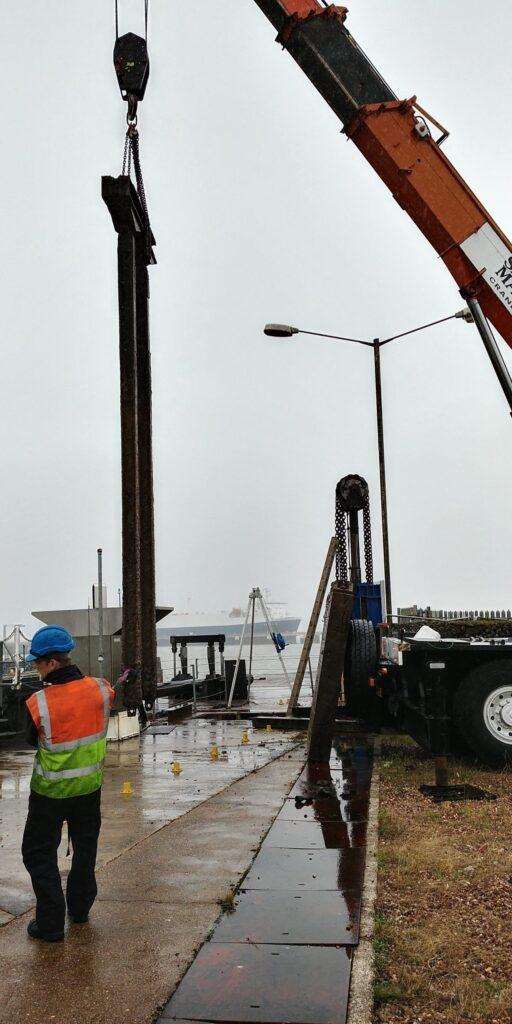 Grimsby Fish Docks - Sluice being lifted by a crane